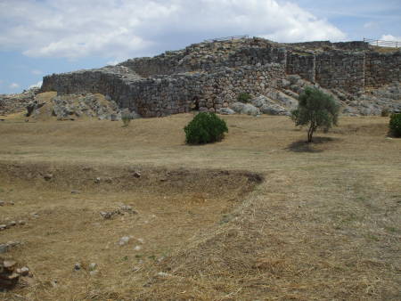 Immense stone walls of the defenses of the Mycenaean city of Tiryns, in the Peloponnese, Greece.