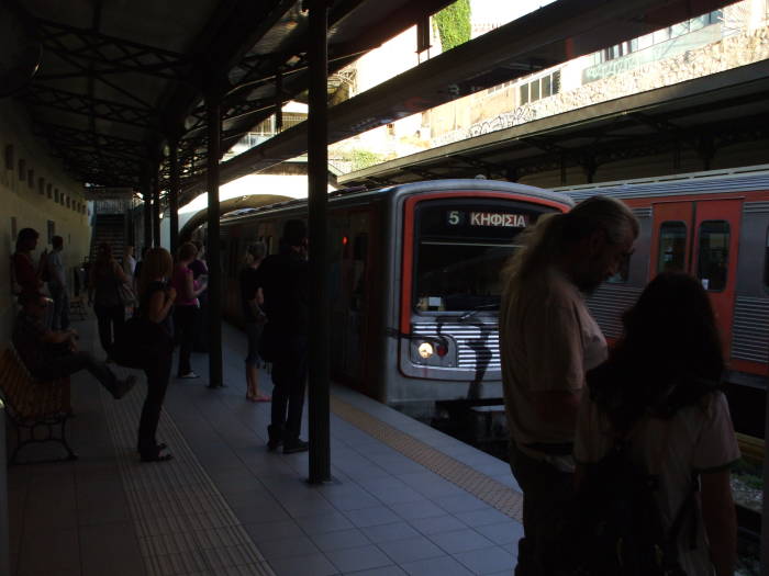 Train arrives at the Monastiraki station in the Athens Metro system.