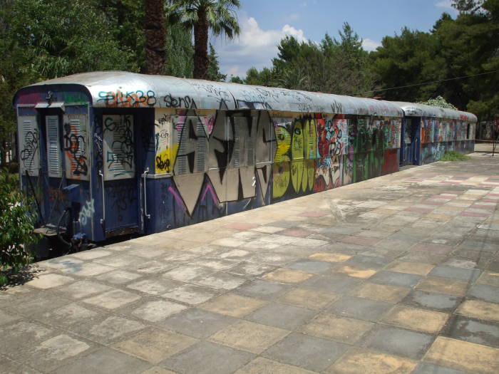 Greek rail car covered in graffiti at Nafplio.