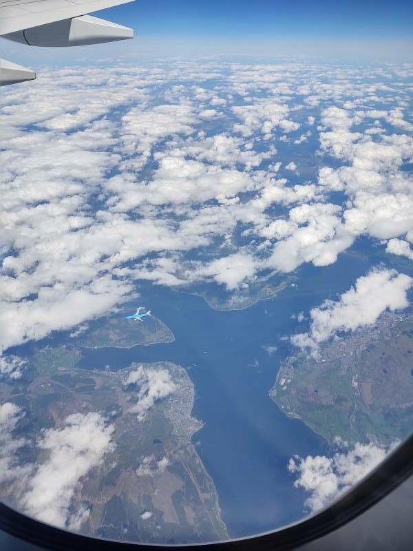 KLM airliner crossing below us above Gare Loch leading to Faslane northwest of Glasgow, on board AF 136 2022-05-19.