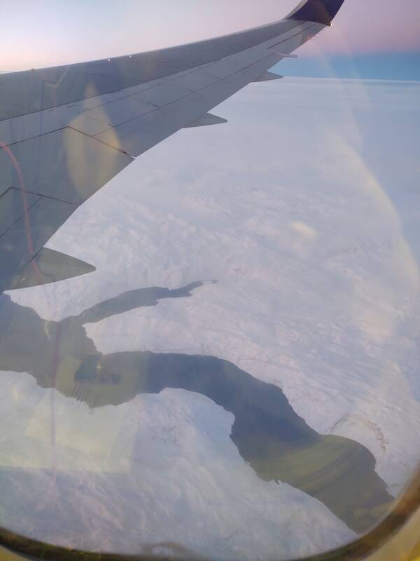 View of Greenland from on board Iceland Air flight 615 from Reykjavík's Keflavík airpot to New York JFK, 06 January 2022, outbound over the west coast of Greenland.