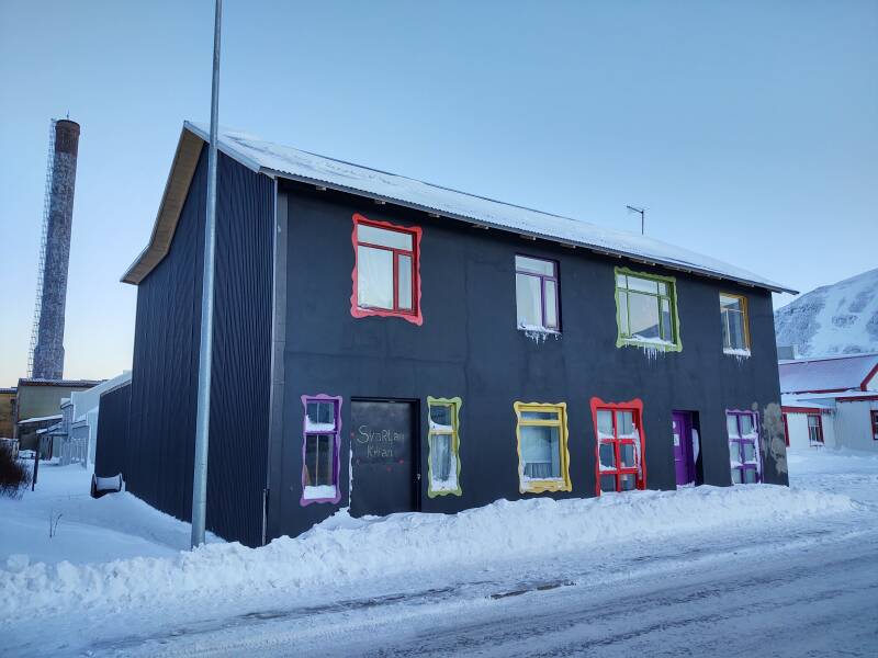 Attractive house with multicolored window frames in Siglufjörður.