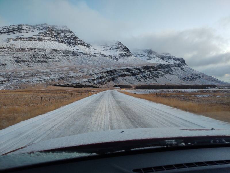 Snow-covered Highway 1 near Breiðdalsvík.