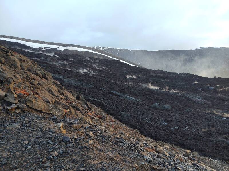 Steam emitted from the edge of the lava flow at Fagradalsfjall volcano.