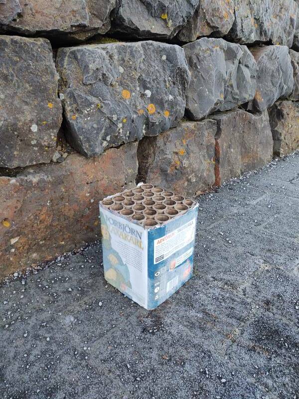 Empty Roman candles launching box after New Year's Eve in Iceland.