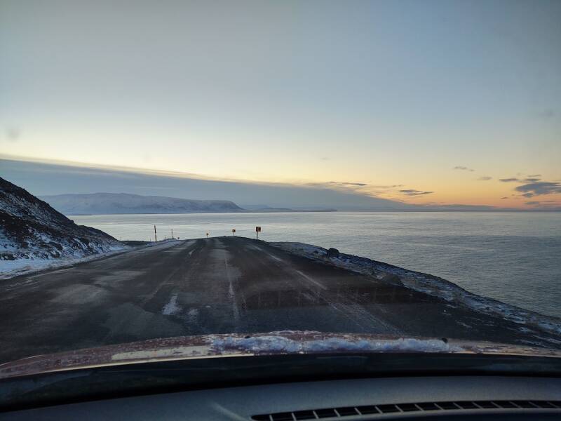 Driving south down the east coast of the Tröllaskagi peninsula, approaching the Miklavatn inlet.
