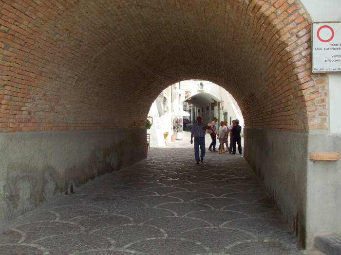 Through the small archway into Piazza Umberto.