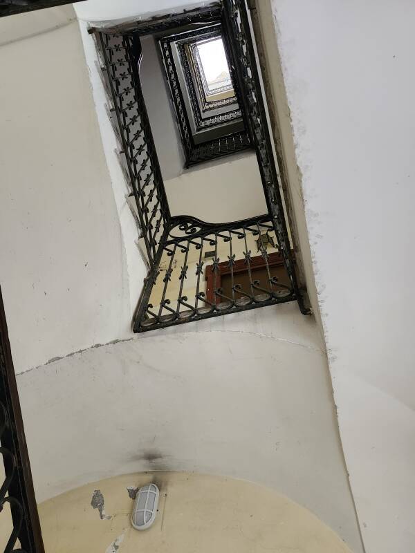 Looking up five stories of stairwell.