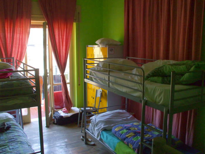 Brightly colored room in the Hostel of the Sun in Naples.