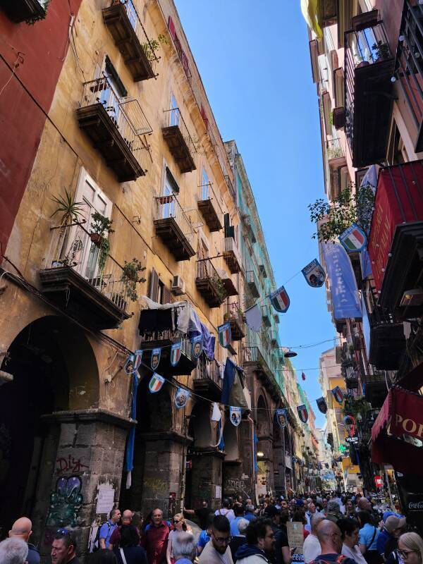 Cafes in archways along Via dei Tribunali.