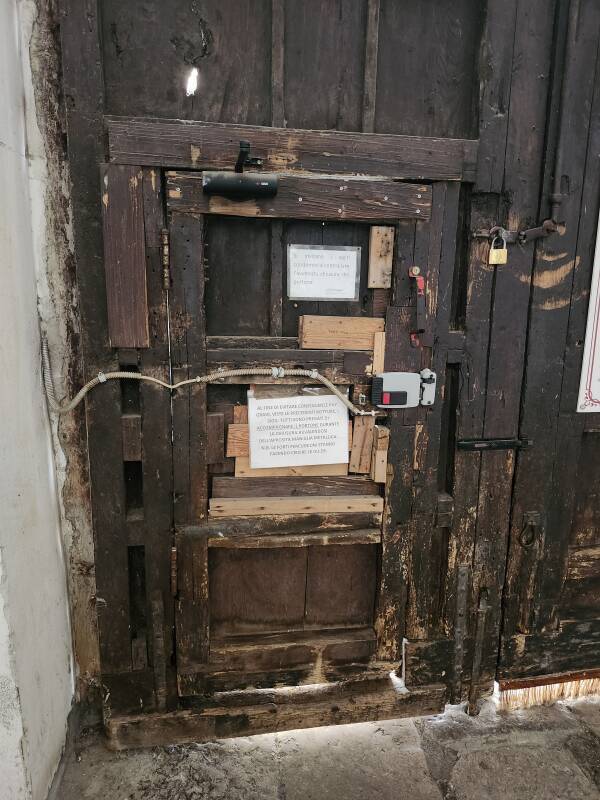 Interior of heavy wooden street door.