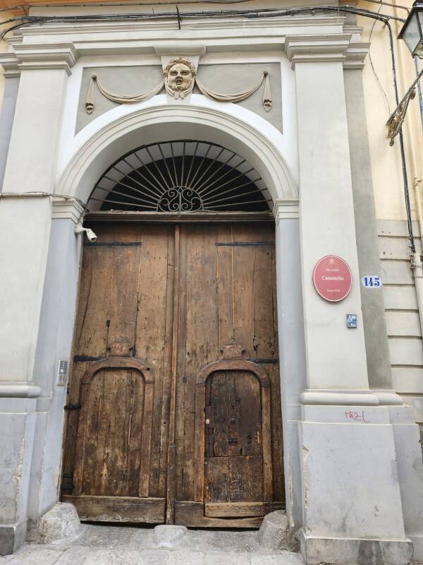 Heavy wooden street door.