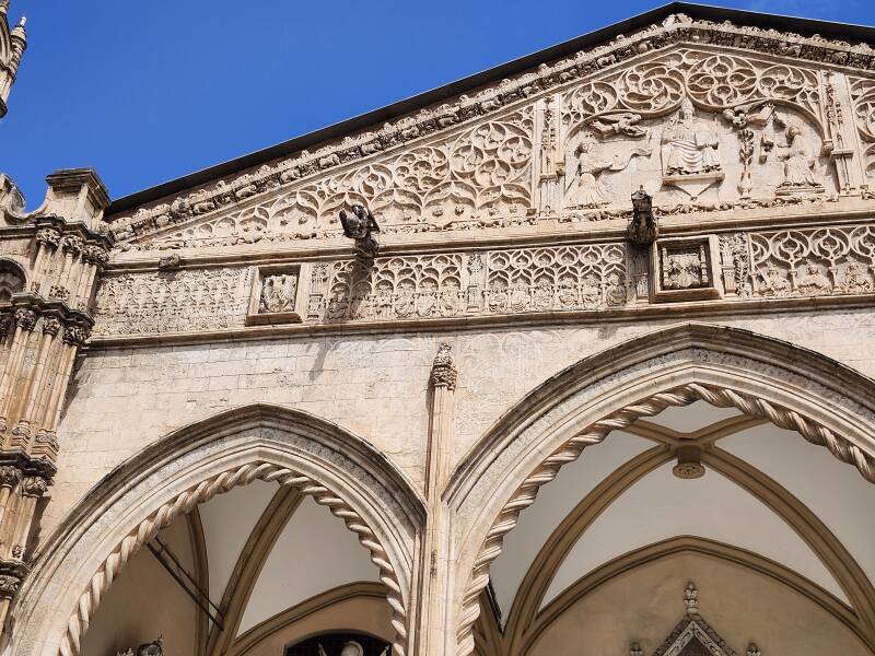 Carved and painted decoration above the portico.