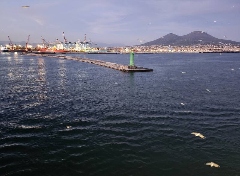 Mount Vesuvius and Naples harbor, seen from an overnight ferry to Palermo while leaving the harbor.