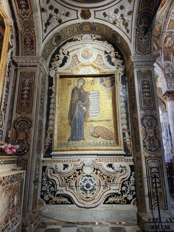 Byzantine mosaic of George as a supplicant to the Virgin Mary, surrounded by Baroque decoration.