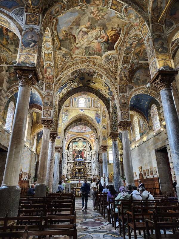 View from near the entryway up the central nave, with Baroque decoration in the relatively newer extension that replaced the narthex.