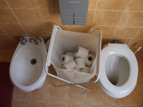 Toilet and bidet in a hostel in Rome.