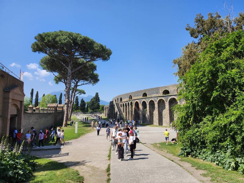 Amphitheatre at Pompeii with Vesuvius in the distance.