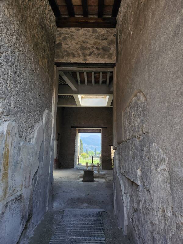 Entryway into an elite home along the south side of Via dell'Abbondanza.
