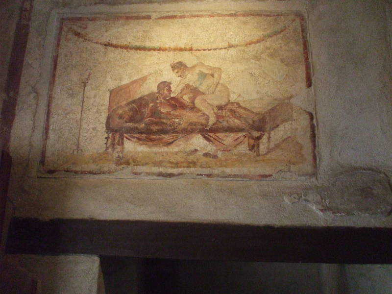 Erotic fresco in the Lupanare, a Roman brothel at Pompeii.
