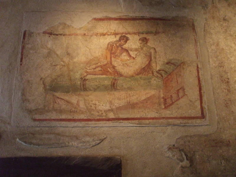 Erotic fresco in the Lupanare, a Roman brothel at Pompeii.