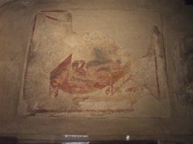 Erotic fresco in the Lupanare, a Roman brothel at Pompeii.