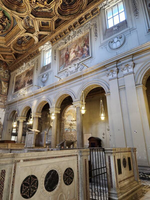 Right aisle with chapels off of it, clerestory windows above.
