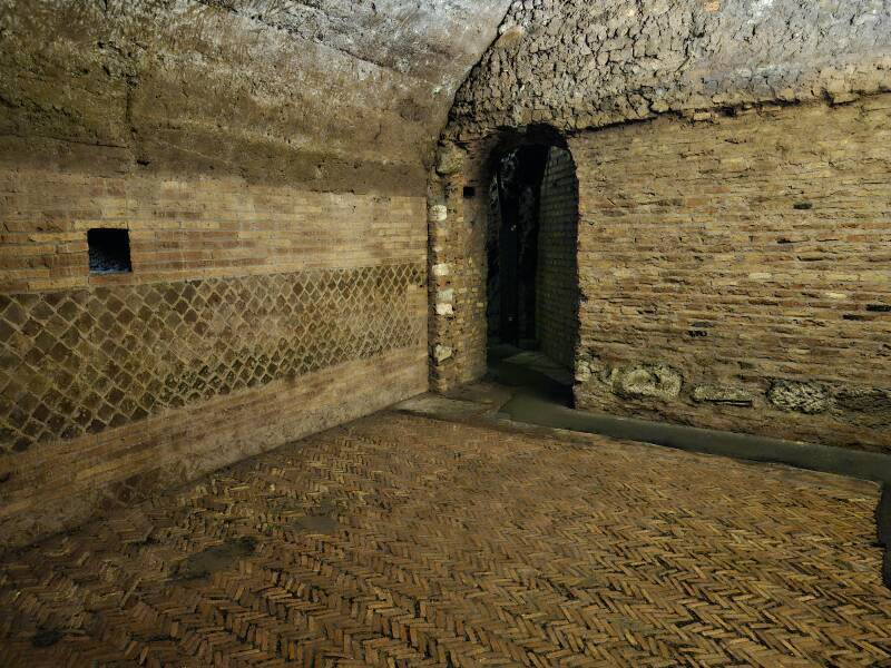 View back through the dwelling from the spring toward the Mithraeum chamber.