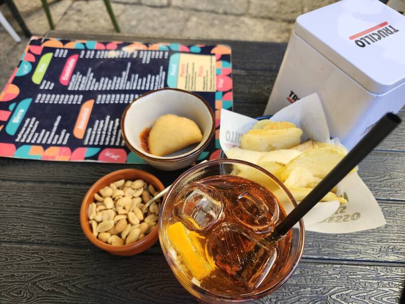 Apertivo of Aperol spritz and snacks.