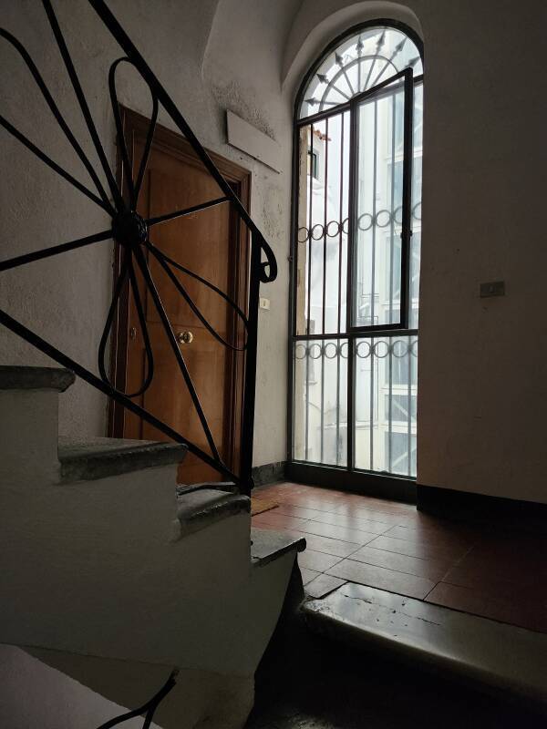 Stairway leading to apartments.