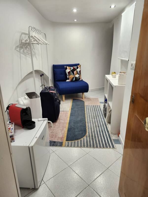 Through the door into an apartment.