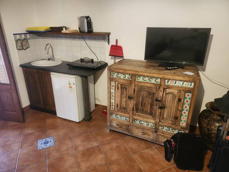 TV and kitchenette area.