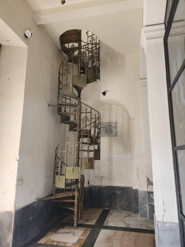 Spiral staircase leading up to the balcony.