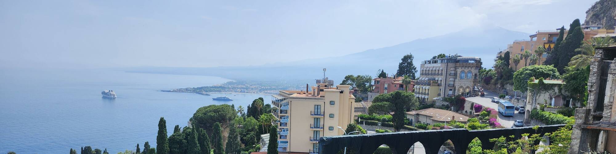 Mount Etna seen from the viewpoint on the road into Taormina.
