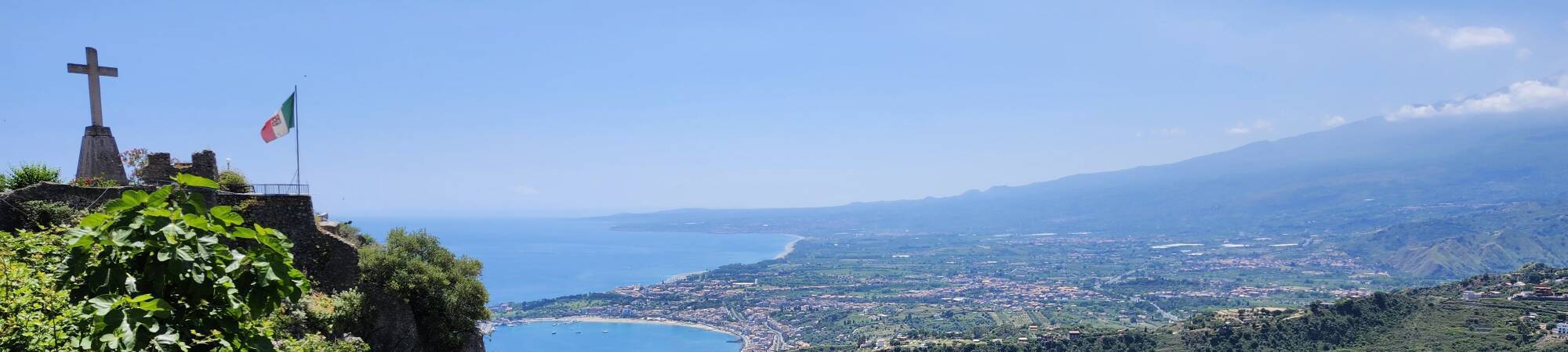 View of Mount Etna and seacoast from the steps from the chapel to the fortress.