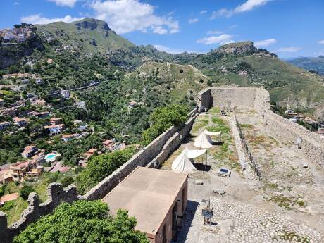 Arab fortress, captured and used by the Normans, with higher peaks in the background.