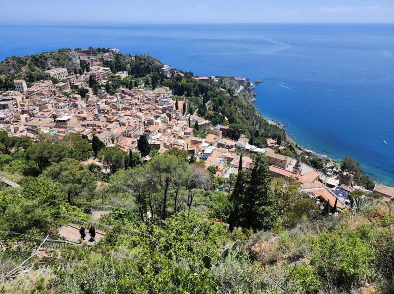 View down over town with ancient Greek theatre clearly visible.