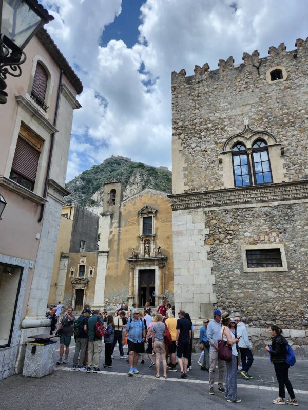 Palazzo Corvaja at right, Church of Saint Catherine of Alexandria at left.