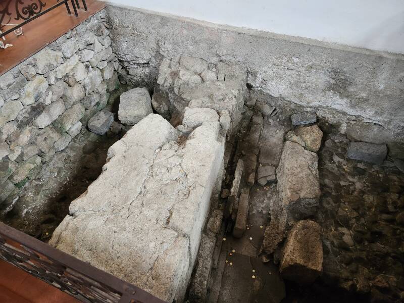 Hellenistic era ruins beneath the floor.