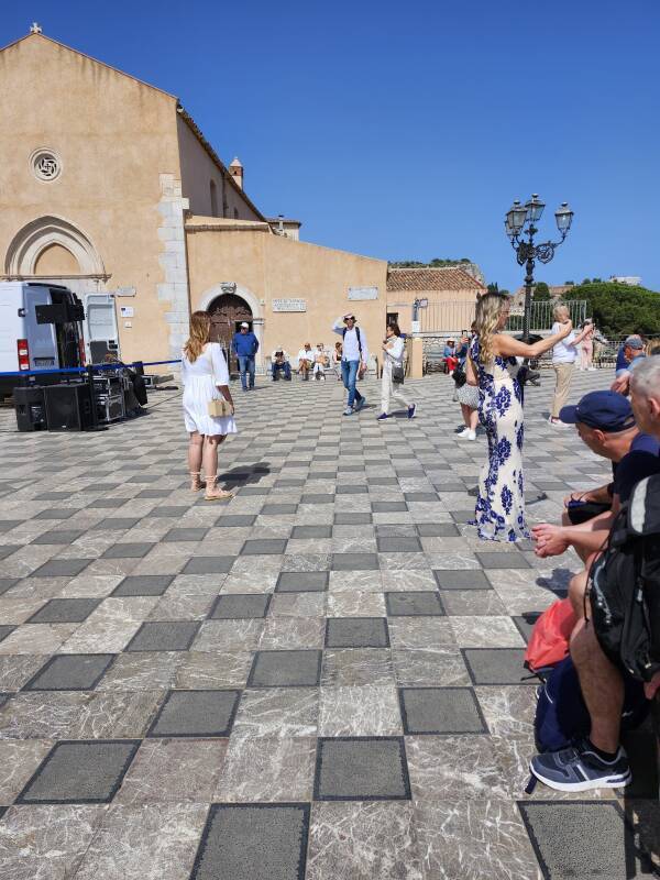 People narcissizing their wedding pre-enactment.