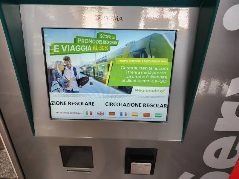 Language selection on the touch screen of a Trenitalia ticket vending machine.