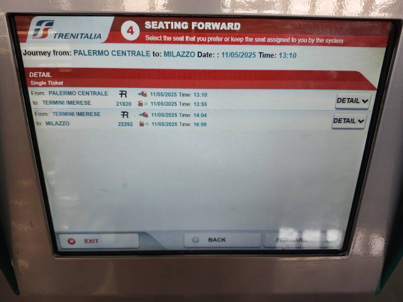 Selecting a seat on the touch screen of a Trenitalia ticket vending machine.