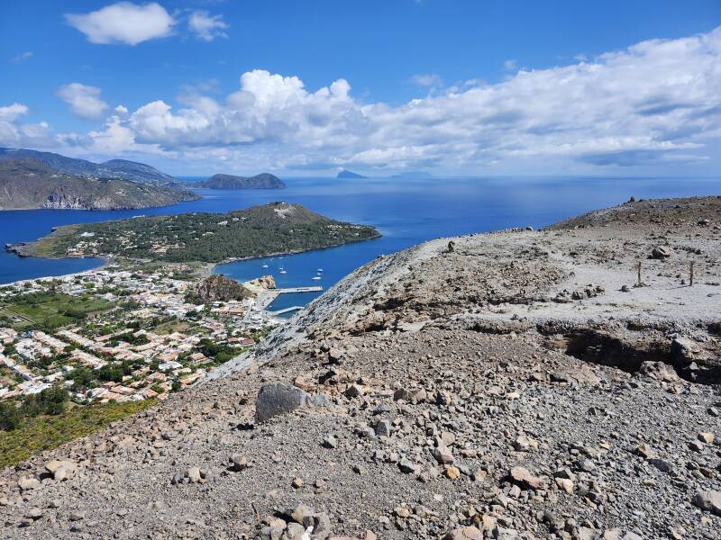 Porto di Levante, the ferry pier, and Vulcanello; beyond that from left to right, Lipari, Panarea, and Stromboli.