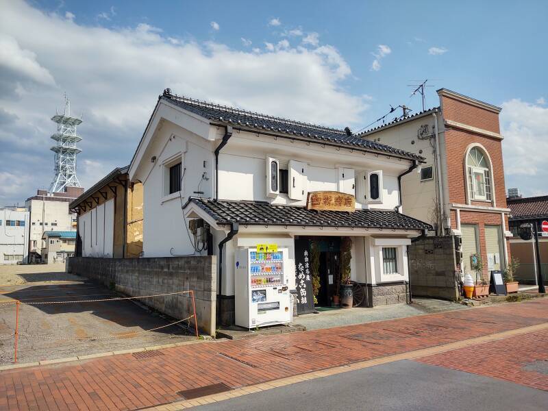 Former sake brewery and a telecommunications tower in Aizu-Wakamatsu.