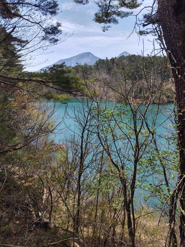 Bishamon-numa Pond with Mount Bandai in the distance, among Goshi-ki-numa or the Five-Colored Lakes.