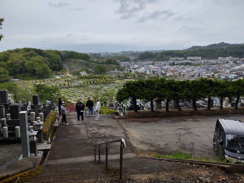 View over modern cemetery and nearby housing district from the hill with kofun in Aizu-Wakamatsu.