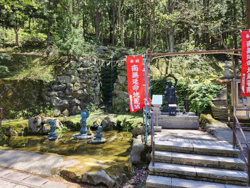 Jizō statues and waterfall at Seiryū-ji.