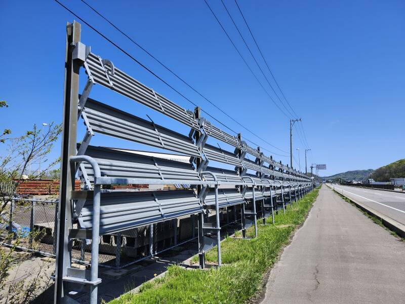 Fully deployed snow fence system.