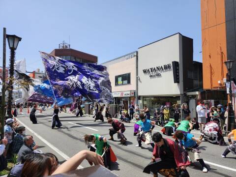 Dancers and banners at the Aomori Spring Festival.