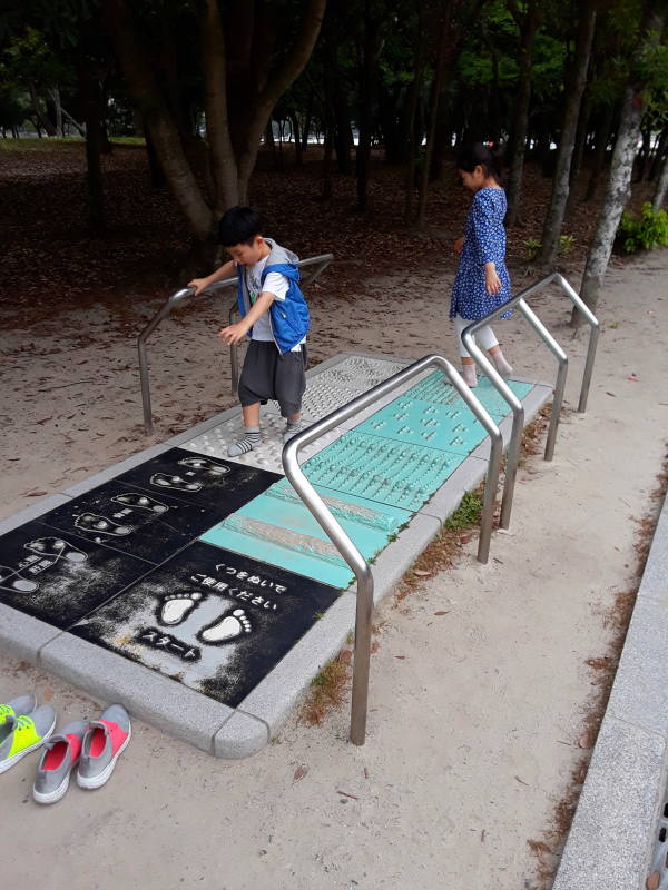 Do-it-yourself reflexology in a park in Fukuoka.